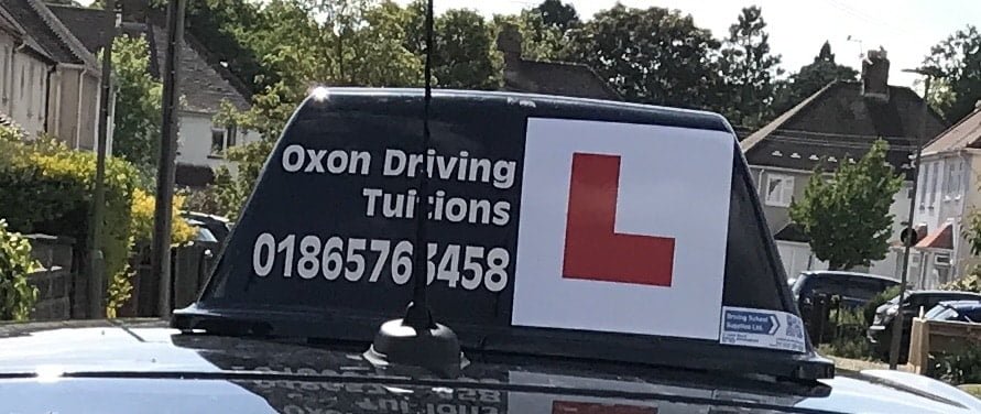Oxon Driving Tuitions automatic driving lesson's car roof sign